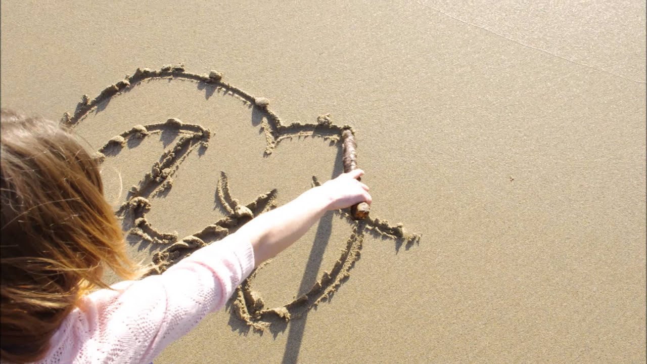 corazones en la playa con nombres